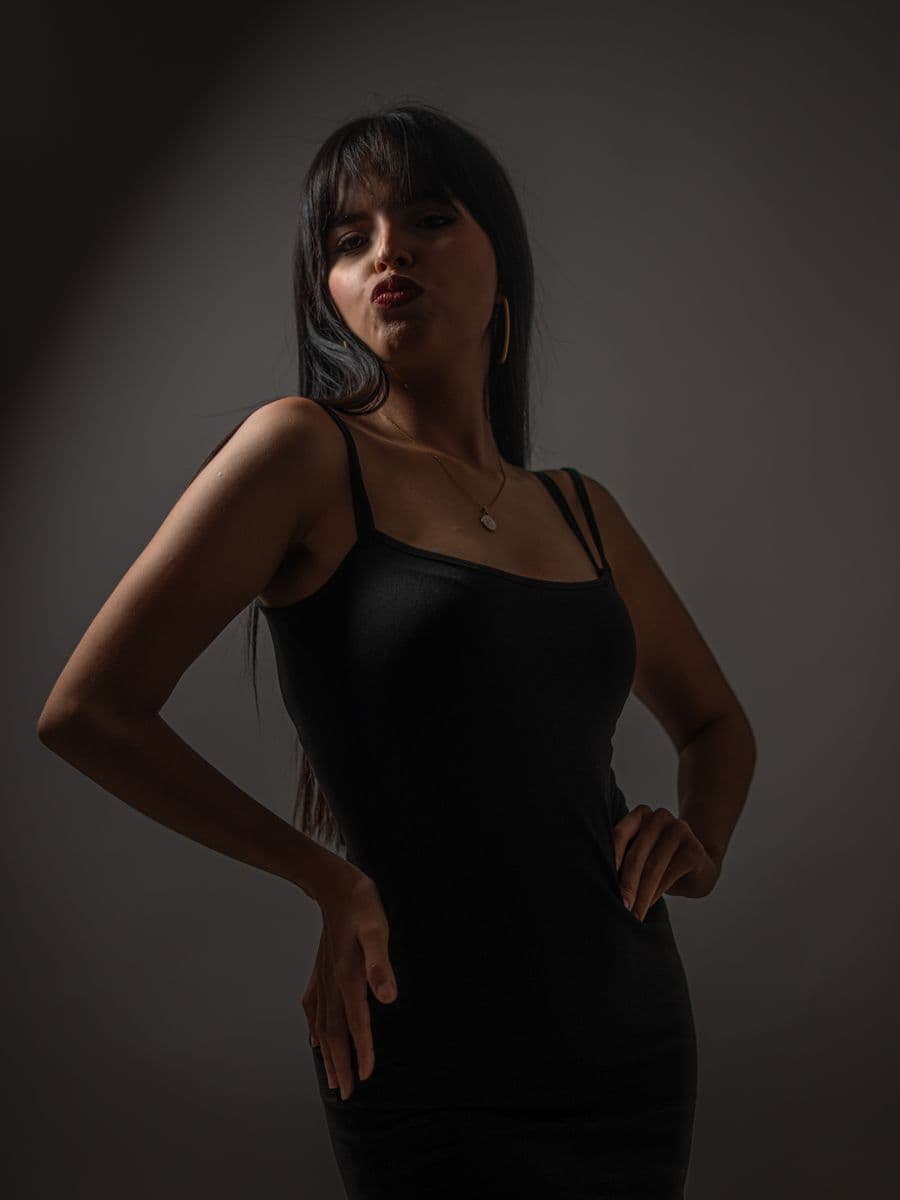 Model in a dark studio